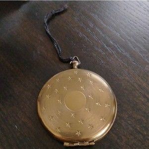 Beautiful vintage makeup compact with mirror goldtone with stars unique rare
